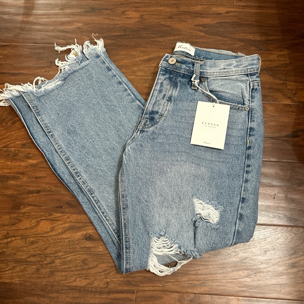 light wash de-stressed jeans